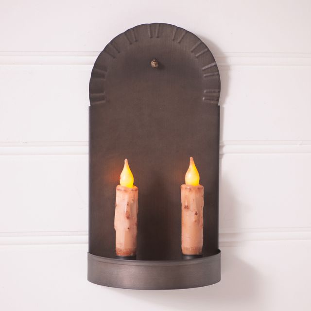 Primitive tin sconce with two ivory color battery operated tapers