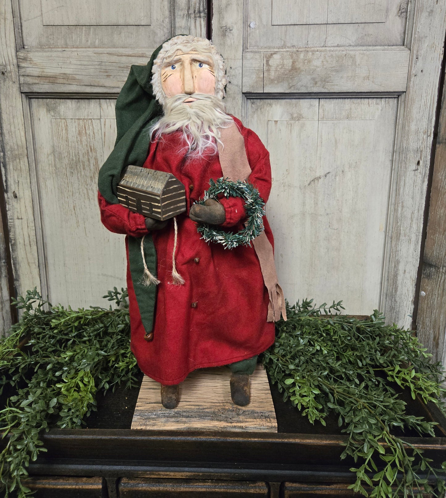 Primitive Santa with Log Cabin and Green Cap