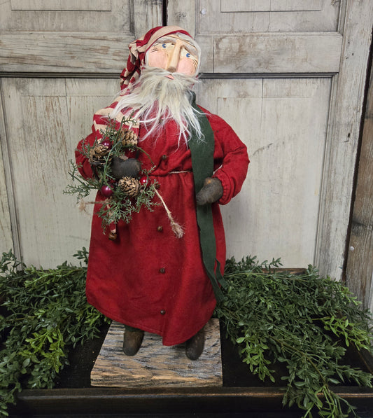 Primitive Clay Face Santa Holding Wreath