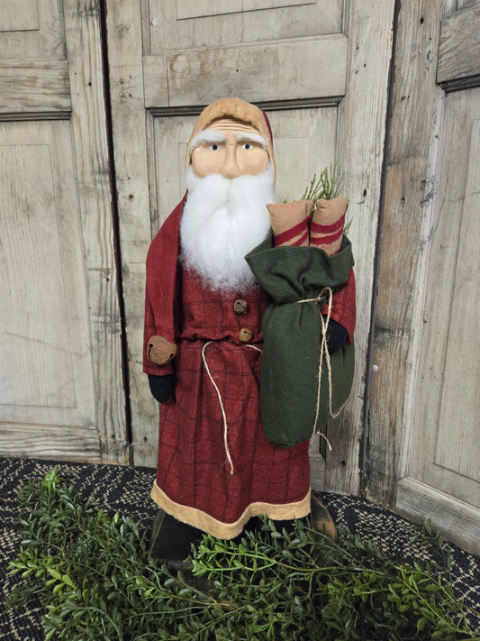 Medium Primitive Santa with Red Plaid Coat with Green Bag and Peppermint Sticks