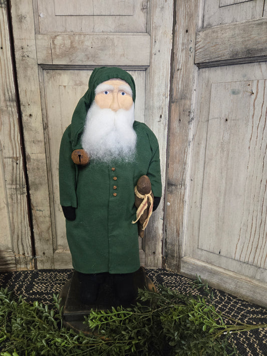 Medium Primitive Santa Wearing Green Coat with Gingerbread Man