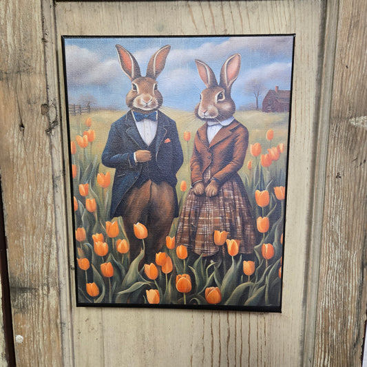 Bunnies with Tulips Canvas Print