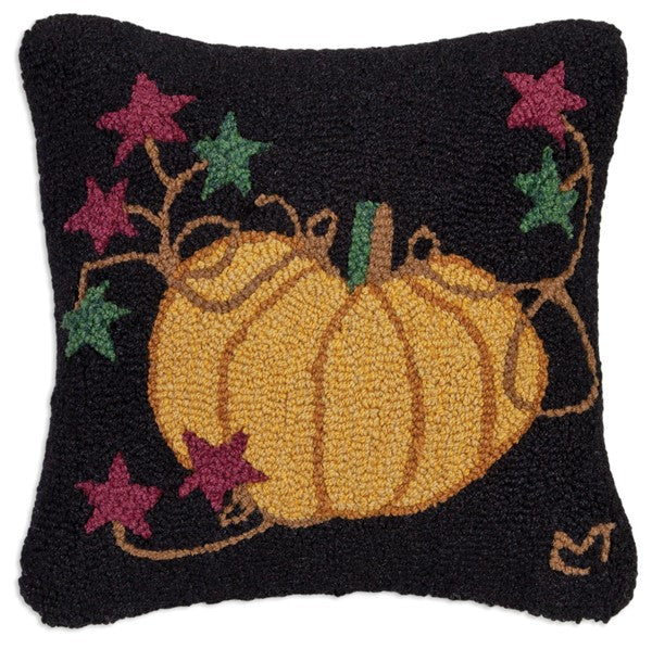 Primitive hooked pillow with Cinderella pumpkin on black