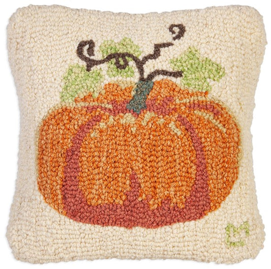 Primitive hooked pillow with orange pumpkin 