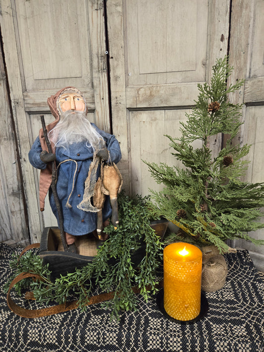 Primitive Santa Holding Christmas Feast