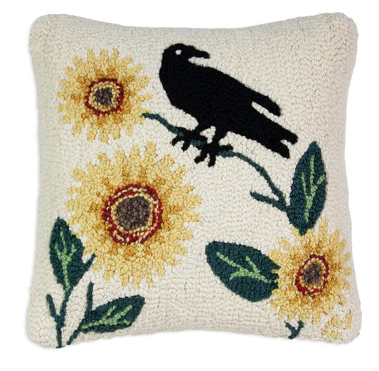 Primitive hooked pillow with crow and sunflowers